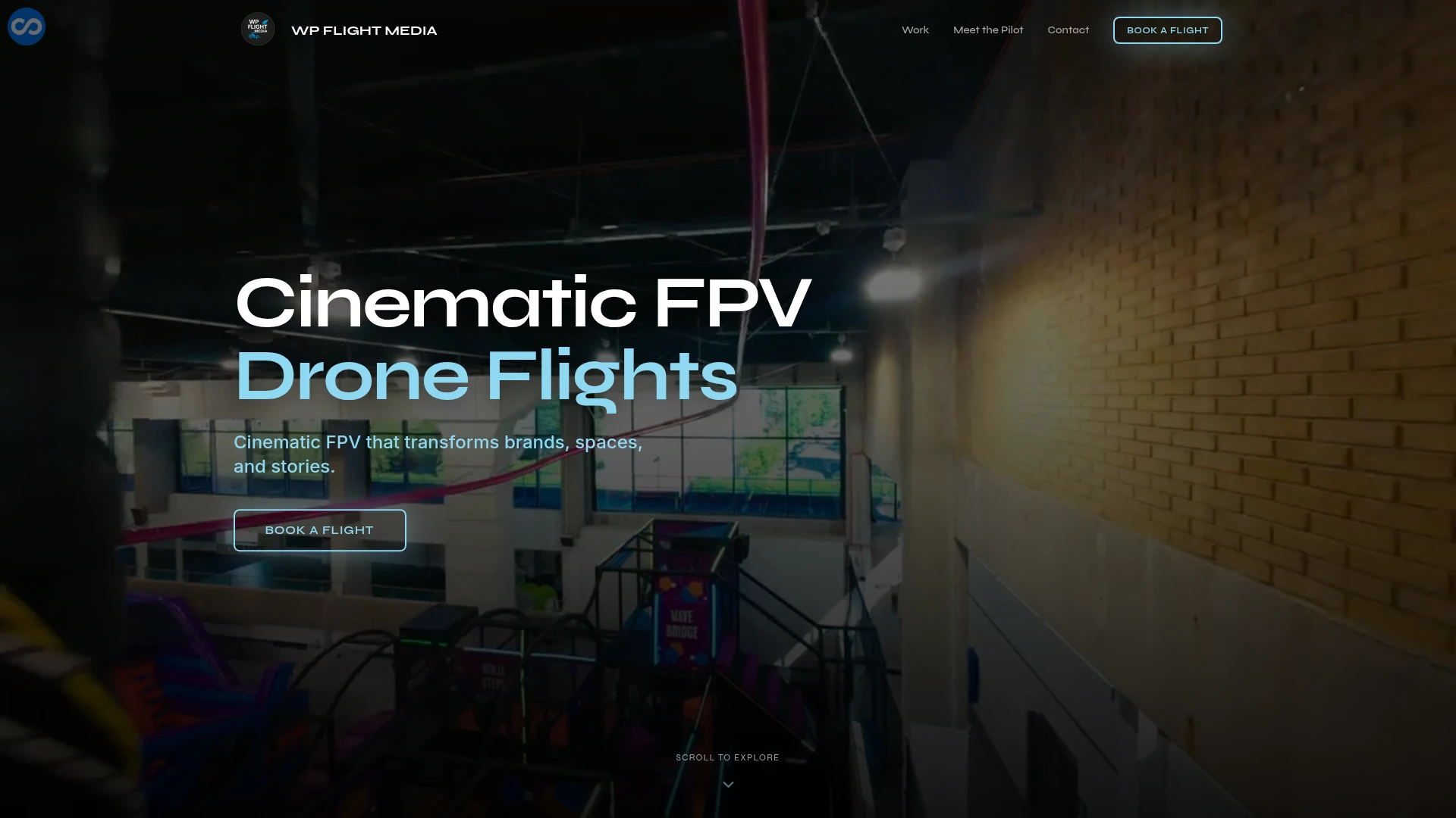 WP Flight Media website with cinematic FPV footage of an indoor flight.